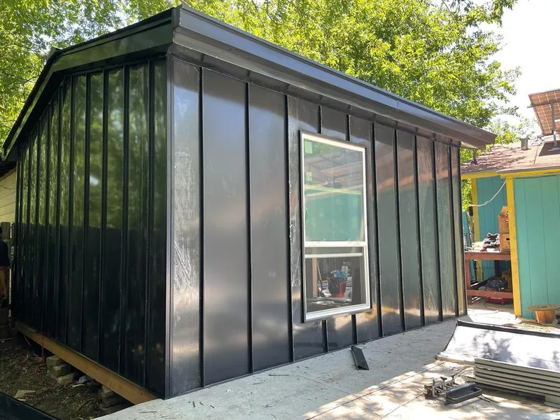 Black standing seam metal wall panels for Metal Roof Installation in Bristol